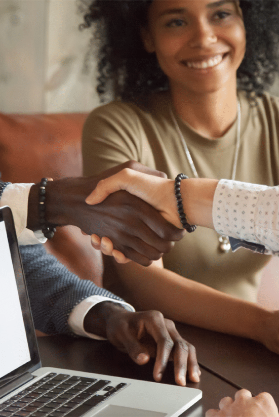 client is shaking hand with lawyer