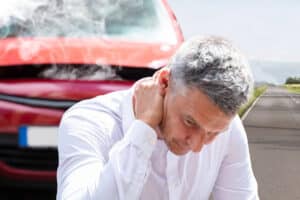 Driver with whiplash after a car accident